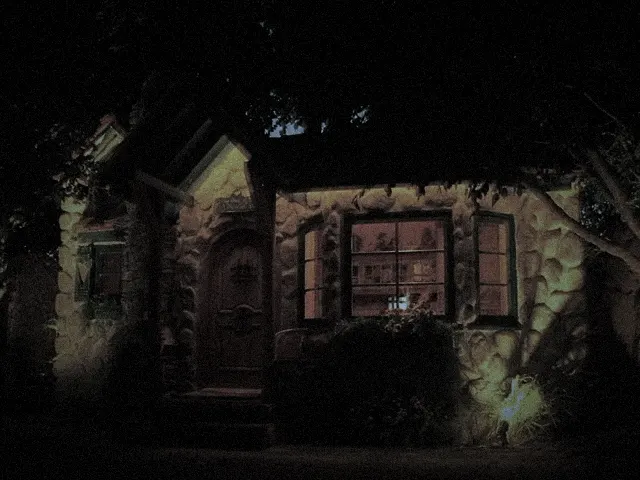 The playhouse at night, seen as if through a security camera