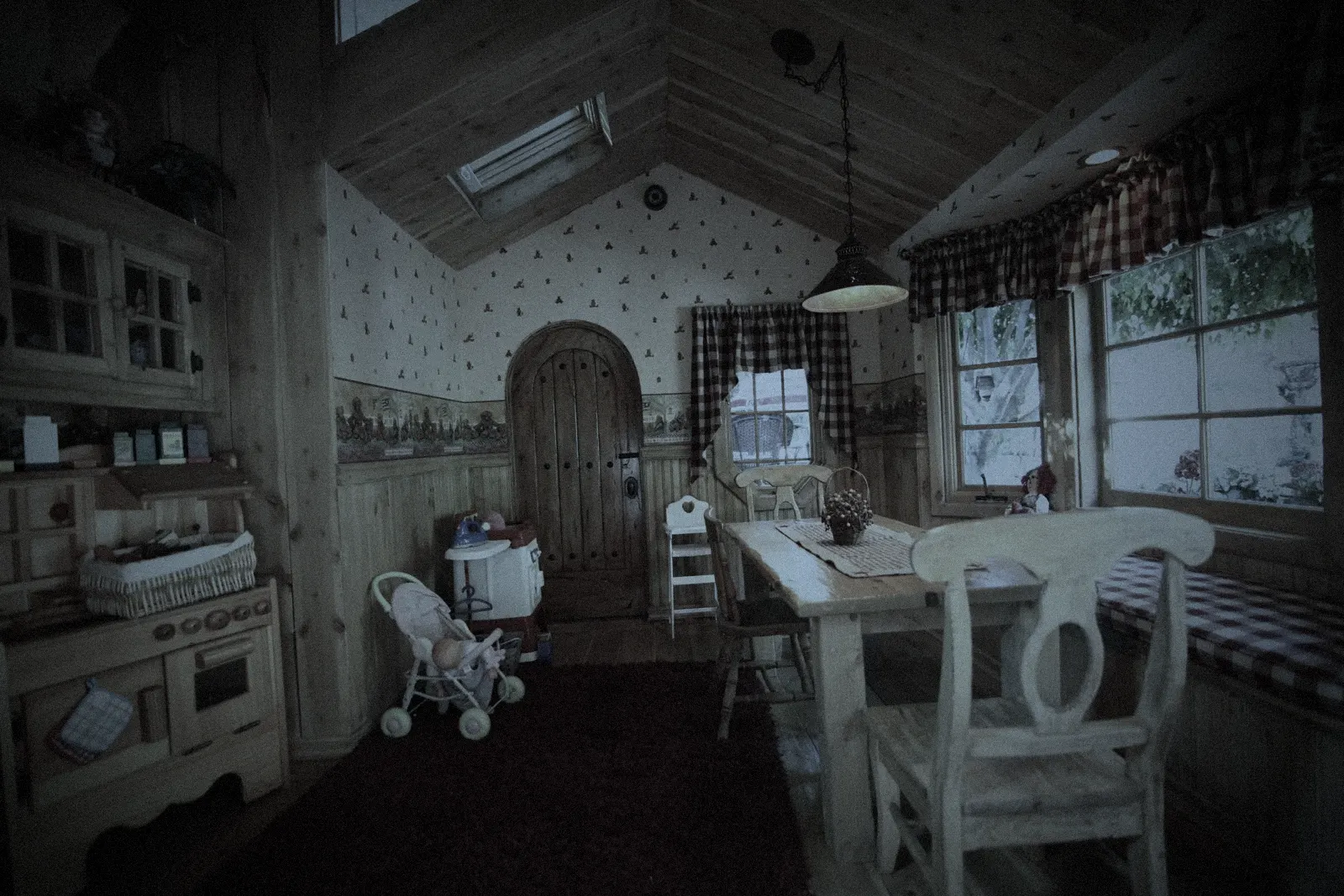 Inside the playhouse, dark and still