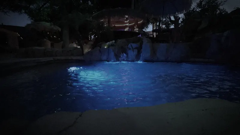 The grotto pool glowing in the dark