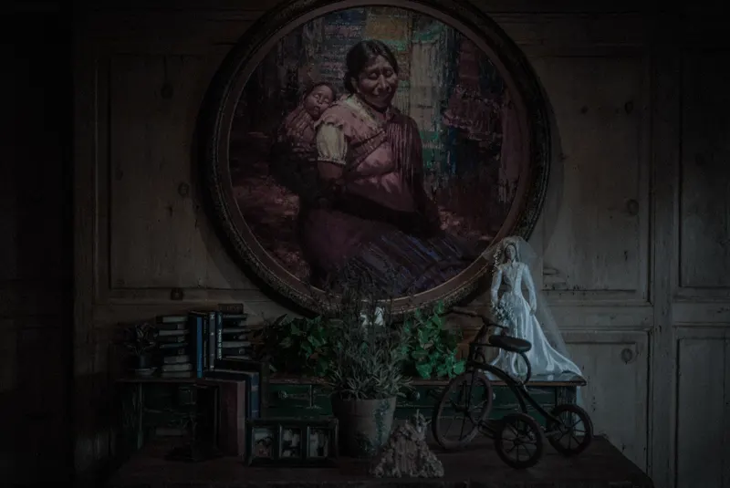 An old painted portrait on the wall of the manor